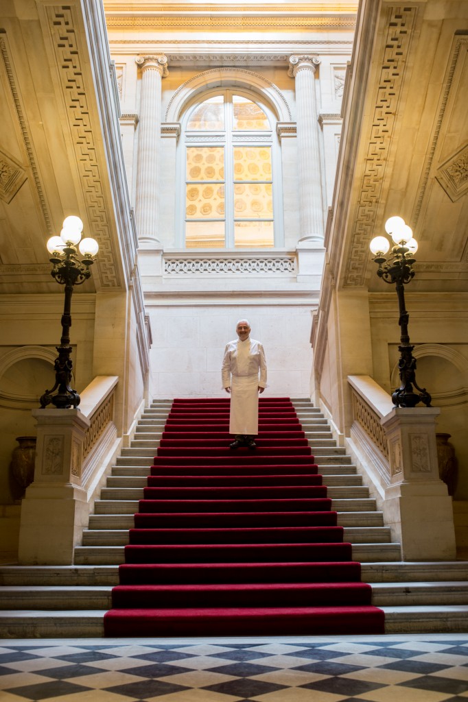 Chef Guy Savoy on the grand staircase at the Monnaie/ Laurence Mouton