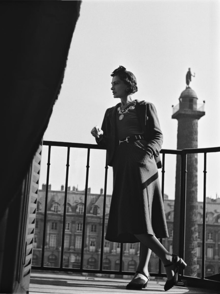 Coco Chanel on the balcony at the Ritz/ courtesy of Ritz Paris