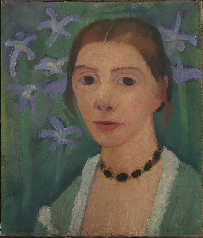 Paula Modersohn-Becker, Self-Portrait With Blue Irises, c. 1905, distress on canvas, 40.7 x 34.5 cm, Kunsthalle Bremen-Der Kunstverein in Bremen; © Paula-Modersohn-Becker-Stiftung, Bremen.