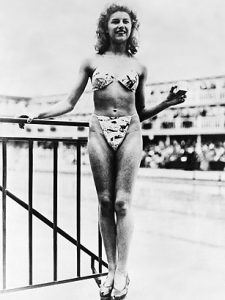 Micheline Bernardini modeling Réard's bikini at the Piscine Molitor in 1946