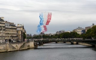 Paris Celebrates a Monumental Weekend: Pomp, Pride, Partying, and Freedom