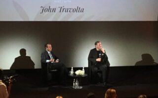 “That’s what I do. I take risks,” John Travolta tells French audiences at Cannes