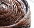 Close up of an all-chocolate puff pastry brioche by La boulangerie Ernest
