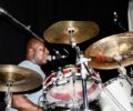 Drum shot of Ralphe Rolle on the mic