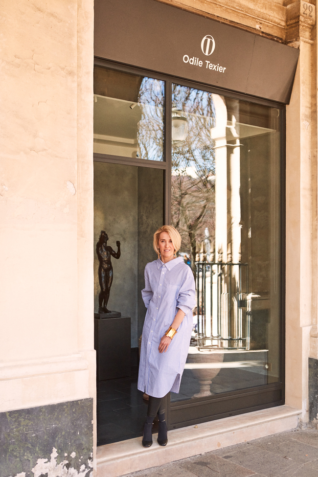 Odile Textier in front of her showroom