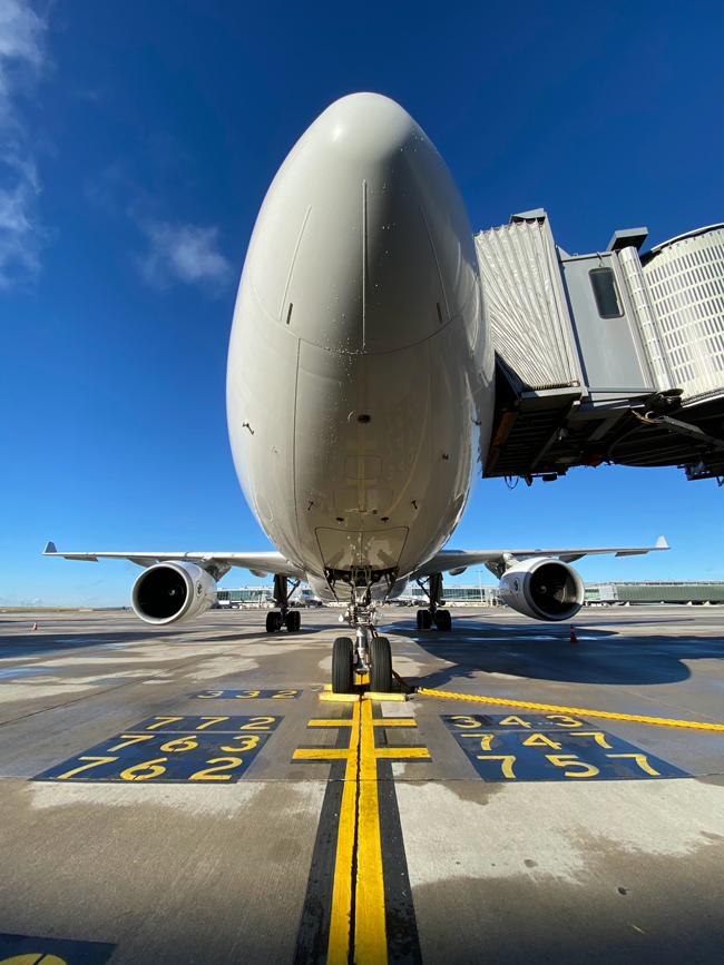 white airplane on airport during daytime