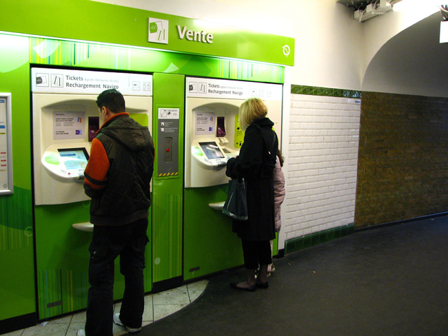 Green metro ticket machine in Paris