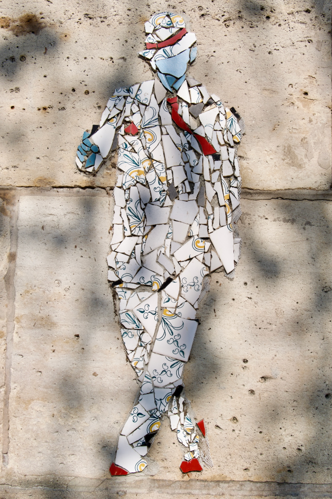 Mosaic style art in the shape of a man