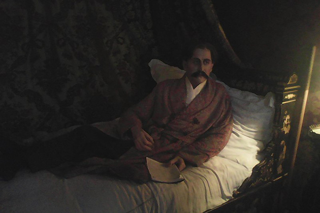 Marcel Proust statue, lounging, in the interior of Château de Breteuil