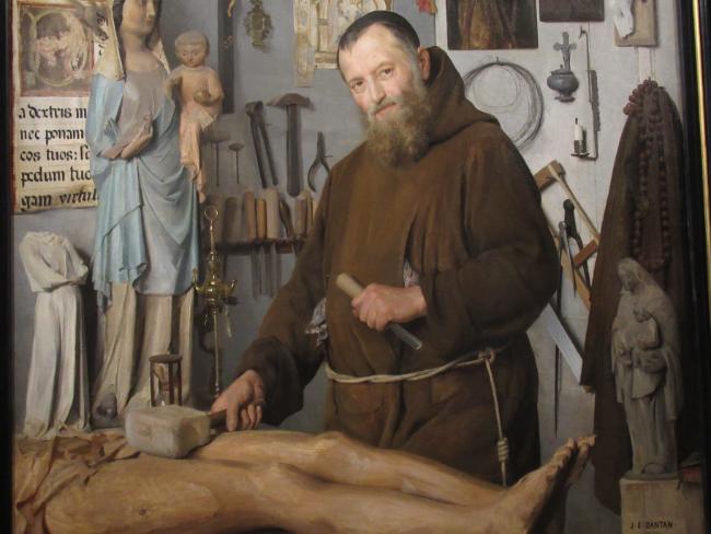 Danton Monk Sculpting a Figure of Christ