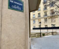 At the top of a flight of stars on the Rue Raynouard, looking over the Parc de Passy.