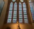 The 1800s stained-glass window that will soon be replaced in the Chapel of Saint Geneviève. © Meredith Mullins.