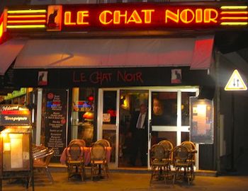 The sign on a hotel at the original location of Le Chat Noir