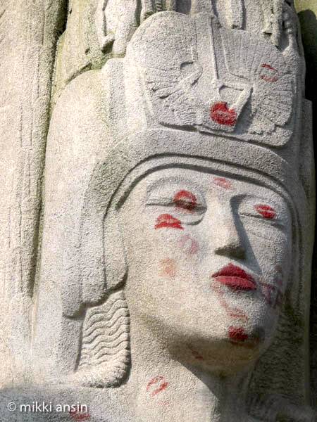 Lipstick kisses left by admirers at Oscar Wilde's tomb at Père-Lachaise. Photo ©Mikki Ansin 2011