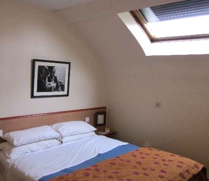 Room with skylight at Hotel Hospitel Dieu