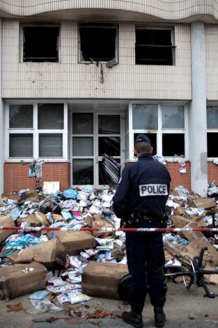 Charlie Hebdo offices in Paris after firebombing. Photo: Thibault Camus, AP
