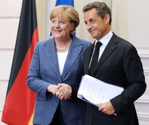 Chancellor Angela Merkel & President Nicolas Sarkozy. Photo credit: AFP/Patrick Kovanik