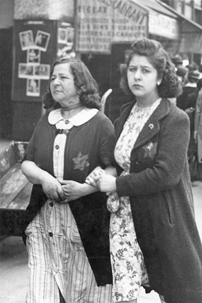 Jewish women in Paris wearing yellow stars. 