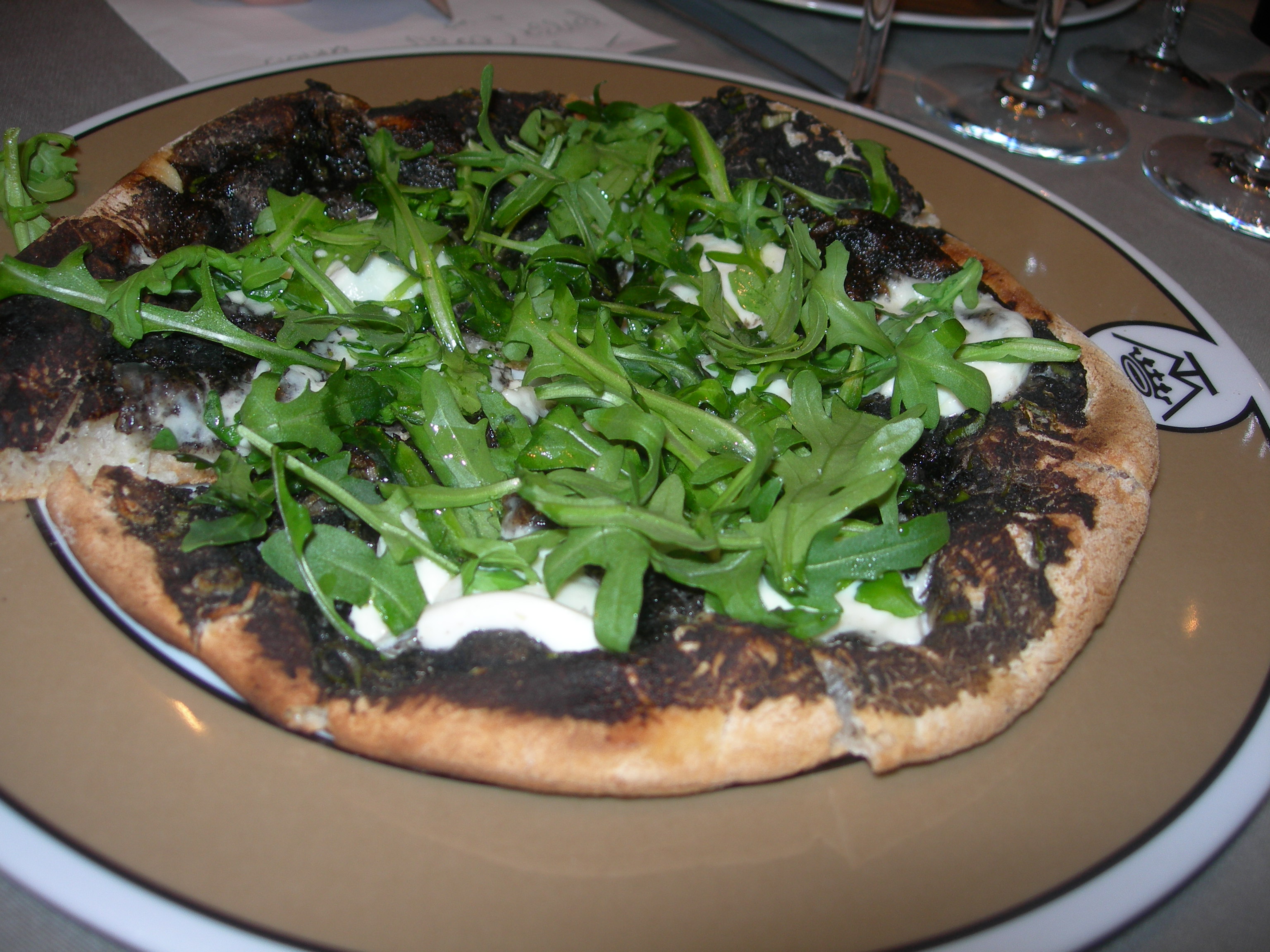 Black truffle pizza from Maison de la Truffe, Paris