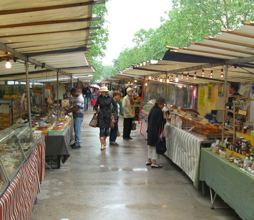 Rain or shine, Saxe-Breteuil market. Photo: Geoff & Ana-Maria