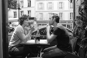 Paris cafe conversation. Photo: Miles Metcalf/Flickr Creative Commons.