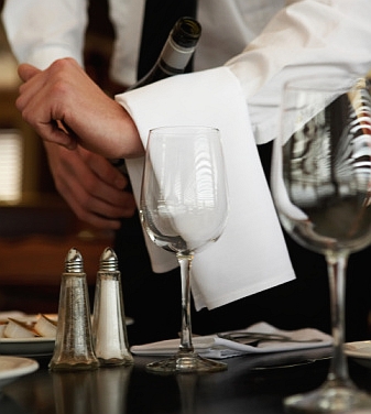 Waiter Serving Wine